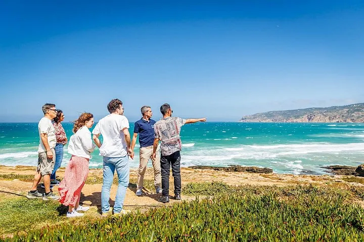 Clients will pass by the stunning Guincho Beach, where the wild waves and golden sands create an unforgettable coastal experience.