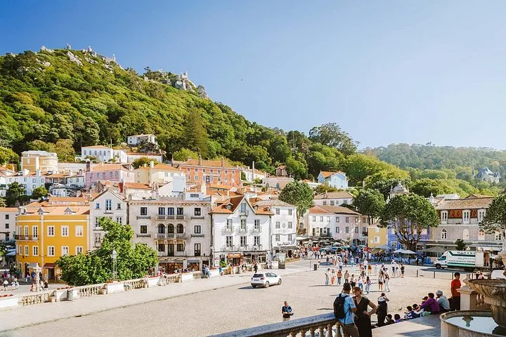 Discover the famous Sintra Town where you will have free time to explore, try some pastries and take pictures of the colorful buildings.